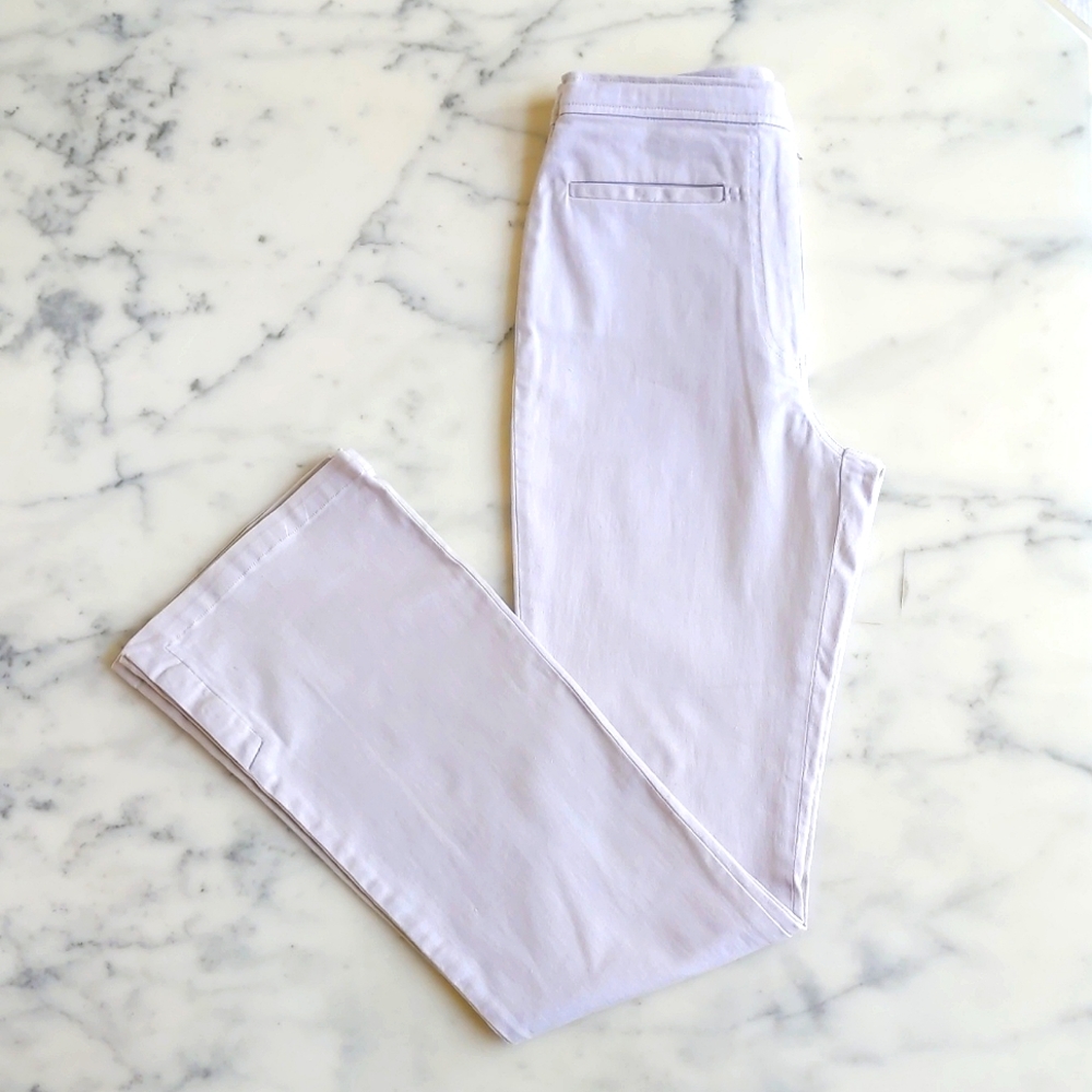 NWOT. Cotton and Lycra High-Waist Flare Leg Stretch Pant w/Side Button Opening.